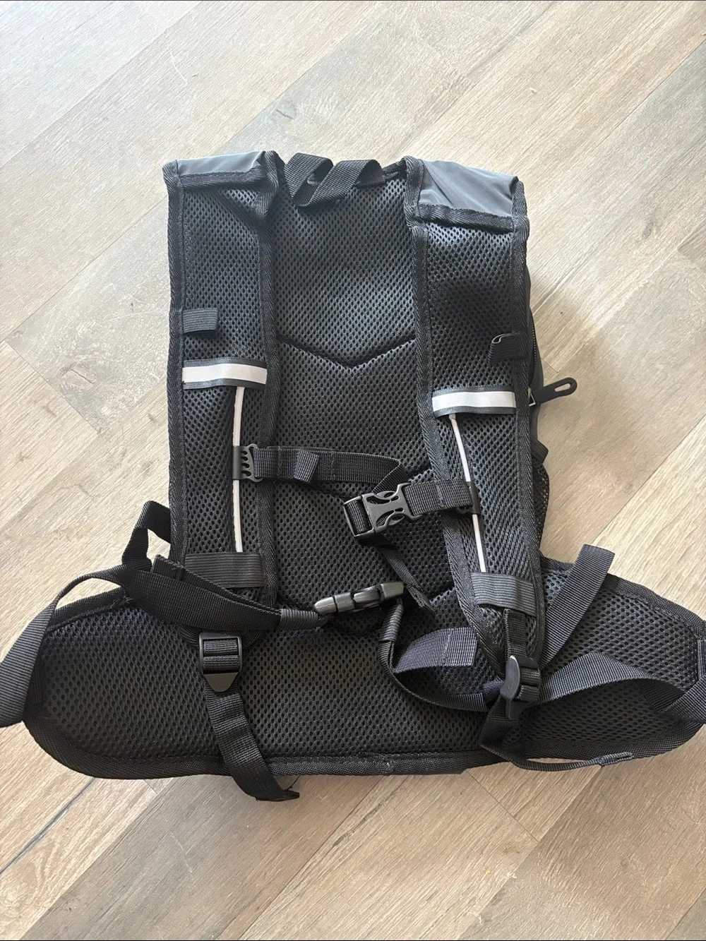 Gray reflective Backpack with water hose compartment